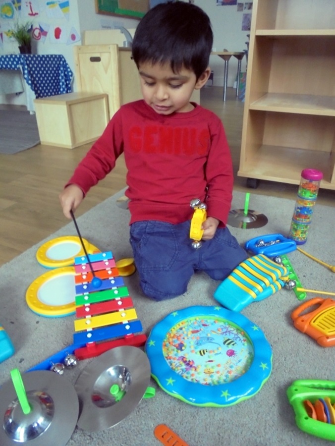 Banstead nursery children explore musical instruments